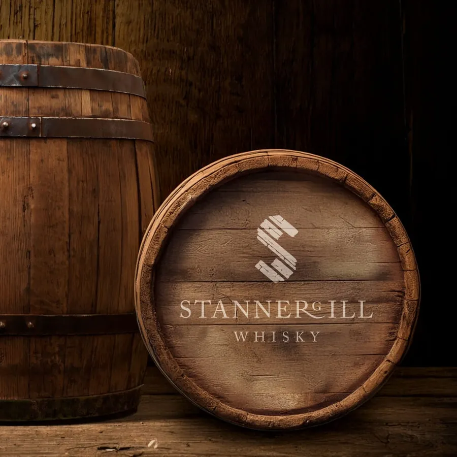A whisky barrel end branded with the Stannergill Whisky logo.